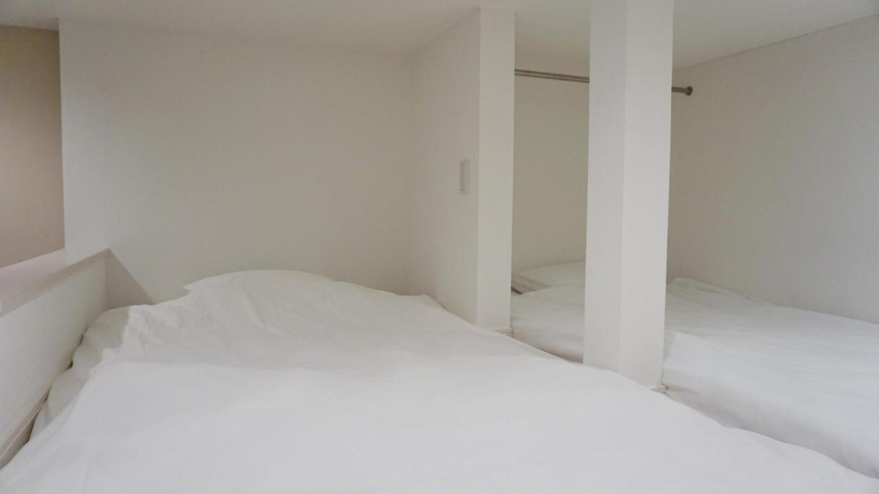 Апартаменты Trip Pod Sumiyoshi B Фукуока Экстерьер фото